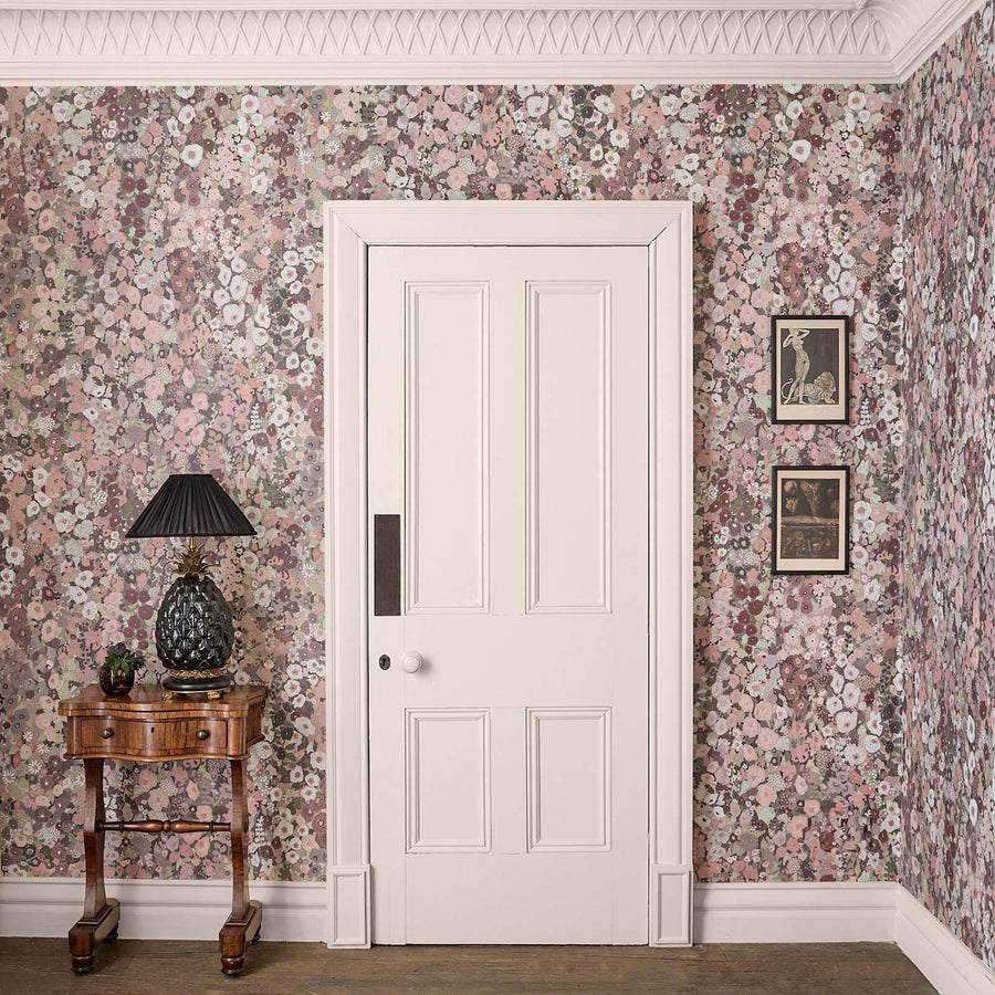 An entry room with floral House of Hackney wallpaper.