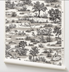 Patterned wallpaper with black and white illustrations of nature and dogs having fun.
