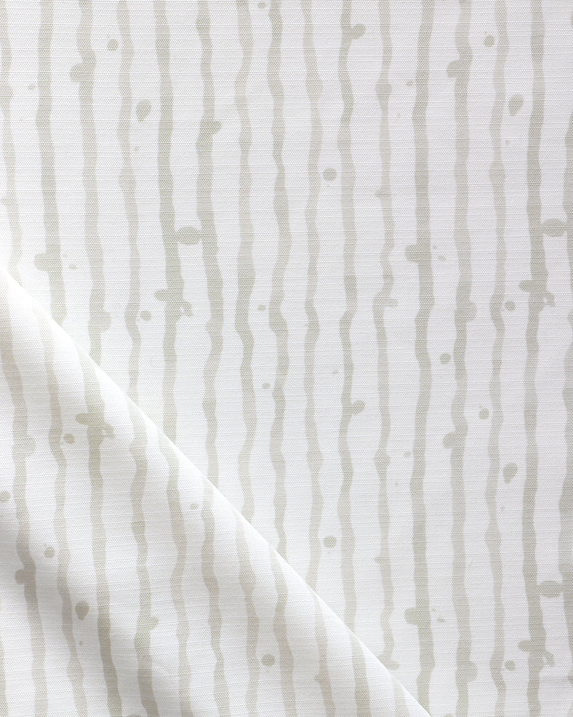 outdoor-fabric-drippy-stripe-sand-neutral-eskayel-fold-web.jpg